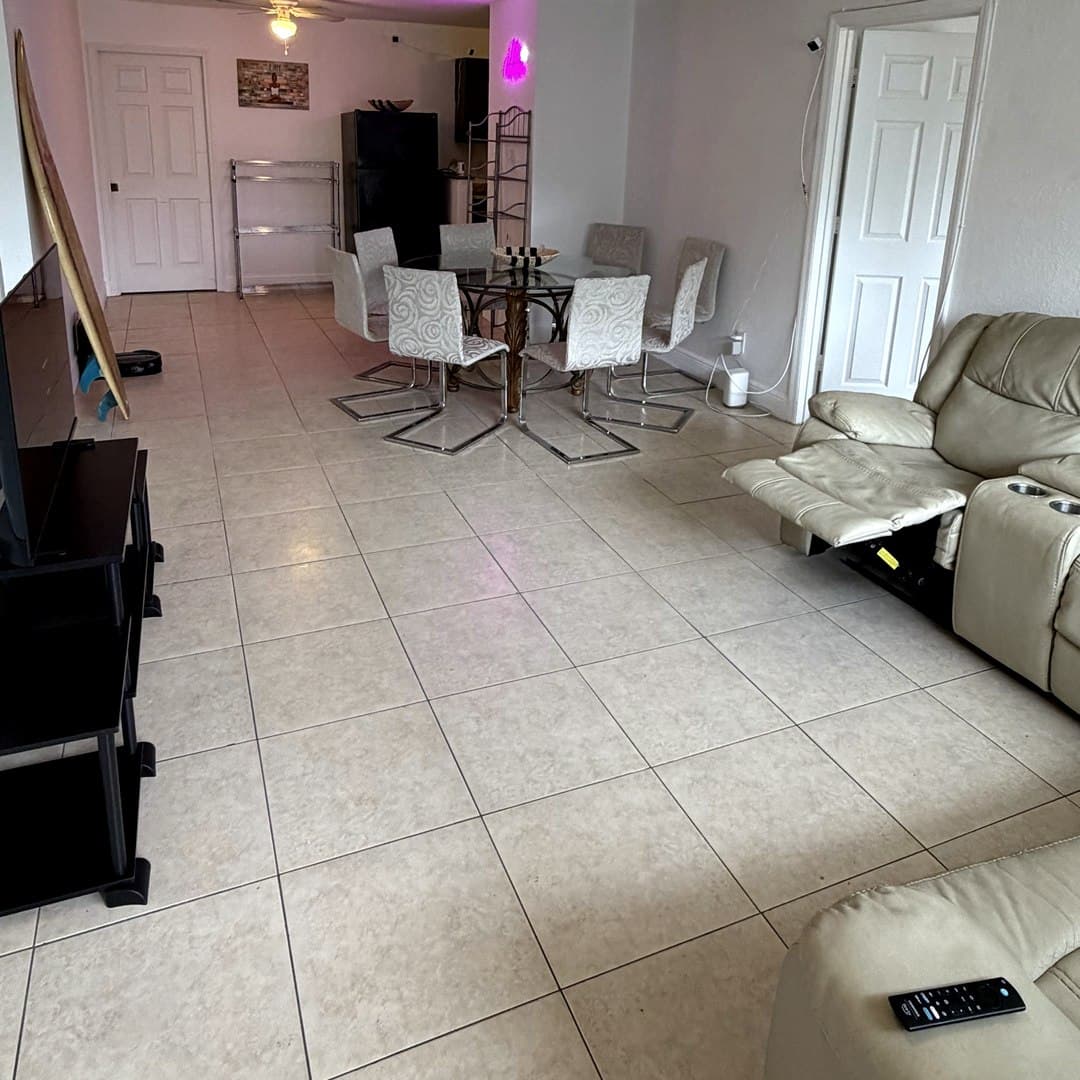 Shared living and dining area at Dania Haven II men's sober living home, Dania Beach FL